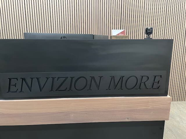 engraved acrylic letters on reception desk